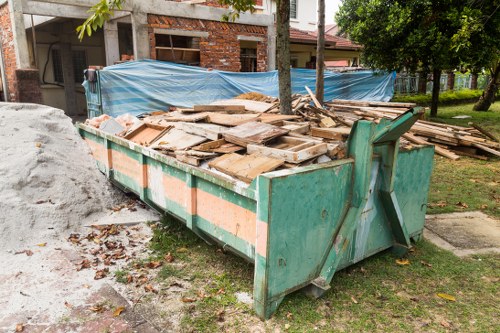 Recycling collection bins outside a commercial property in Richmond upon Thames